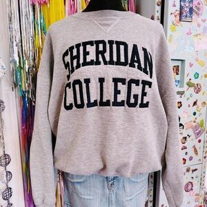 Vintage Sheridan college Russell athletic sweatshirt .